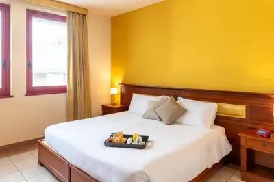 Letto o letti in una camera di Hotel Vecchio Casello