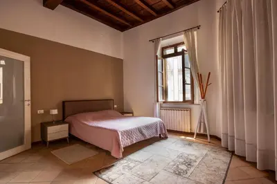 Letto o letti in una camera di CasaLonghi