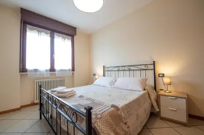 Letto o letti in una camera di Case Lanfranco Parma