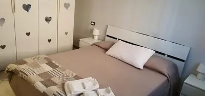 Letto o letti in una camera di Case Lanfranco Parma