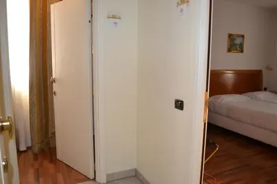 Letto o letti in una camera di Tricolore Hotel