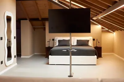 Letto o letti in una camera di Rooms Don Alfonso