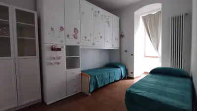 Letto o letti in una camera di I love Rapallo La casa AlMar