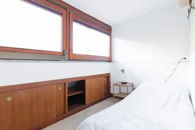 Letto o letti in una camera di Casa Caterina