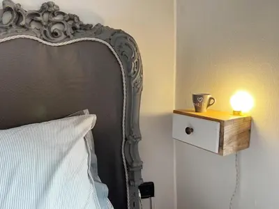 Letto o letti in una camera di Lovely nest in Parma centro