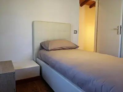 Letto o letti in una camera di Casa Stella vicinanze Maranello