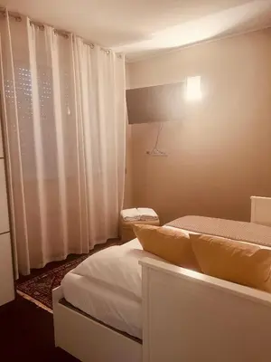 Letto o letti in una camera di Appartamento incantevole a piacenza