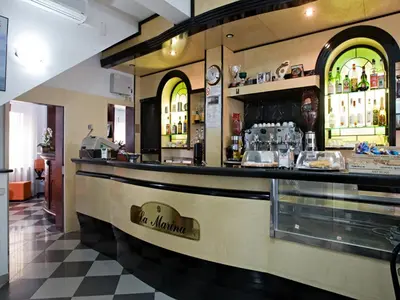 Salone o bar di Albergo La Marina B&B