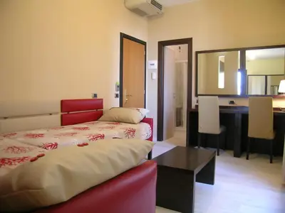 Letto o letti in una camera di Albergo La Marina B&B