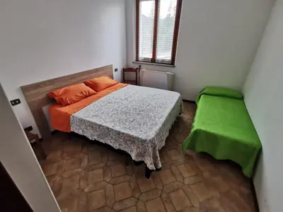 Letto o letti in una camera di Appartamento Lucia