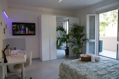 TV o dispositivi per l'intrattenimento presso Guest House Oasi Dei Mille