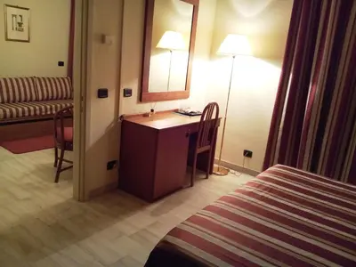 Letto o letti in una camera di Hotel Select