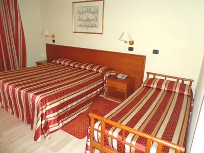 Letto o letti in una camera di Hotel Select