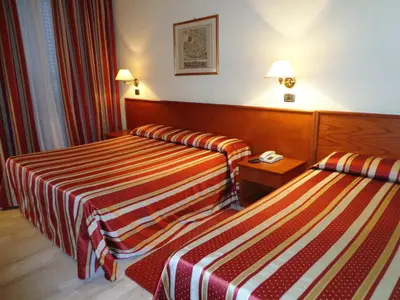 Letto o letti in una camera di Hotel Select
