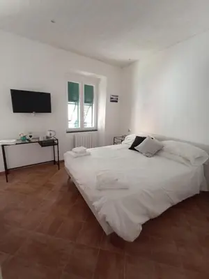 Letto o letti in una camera di Elicriso Apartment Affittacamere