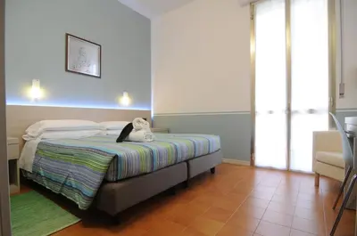 Letto o letti in una camera di Hotel Astoria