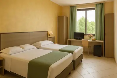 Letto o letti in una camera di Airone Hotel