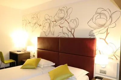 Letto o letti in una camera di Hotel Villa Nabila