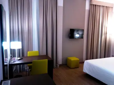 Letto o letti in una camera di Hotel Villa Nabila