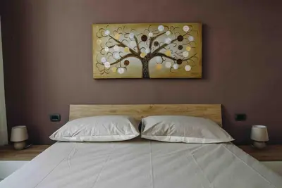 Letto o letti in una camera di La Terra del Mare