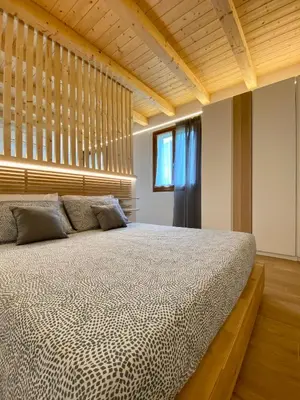 Letto o letti in una camera di MARCO APARTMENTS di Locanda da Marco