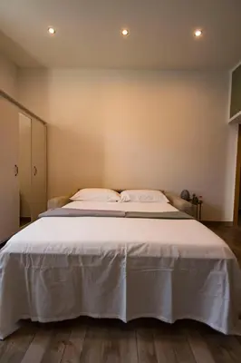 Letto o letti in una camera di Cà da Milly