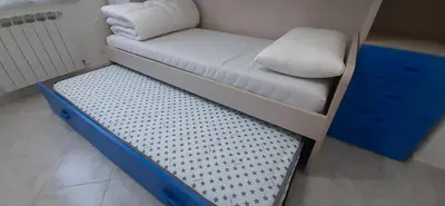 Letto o letti in una camera di Casa Cetti