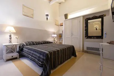 Letto o letti in una camera di Hotel Al Convento