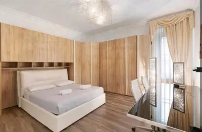 Letto o letti in una camera di Residenza Tosca