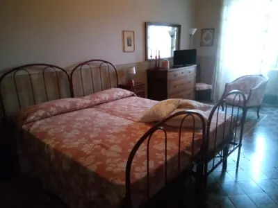 Letto o letti in una camera di Casa della Ludo B&B