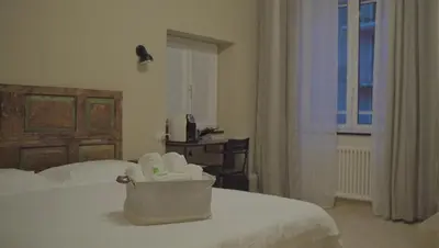 Letto o letti in una camera di Piccolo Borgo