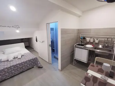 Letto o letti in una camera di Alle Mansarde