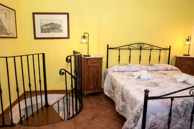 Letto o letti in una camera di Ca' Tonino