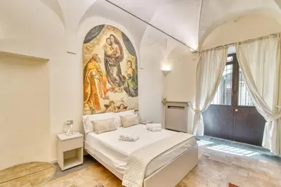 Letto o letti in una camera di Il Loft di Quintino