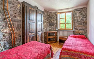 Letto o letti in una camera di Amazing Home In Loco Di Rovegno