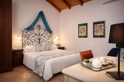 Letto o letti in una camera di Hotel Del Borgo