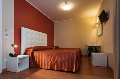 Letto o letti in una camera di Hotel Villa Molinari