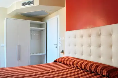 Letto o letti in una camera di Hotel Villa Molinari