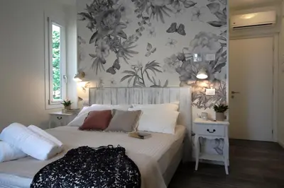 Letto o letti in una camera di Bed & Basta City