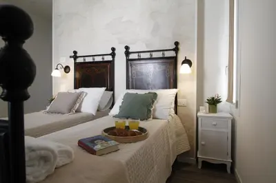 Letto o letti in una camera di Bed & Basta City