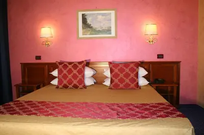 Letto o letti in una camera di Hotel Abacus