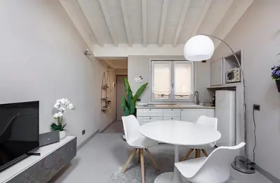 TV o dispositivi per l'intrattenimento presso HOUSE Cavour 24 In the heart of Downtown Parma