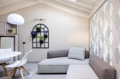 Area soggiorno di HOUSE Cavour 24 In the heart of Downtown Parma