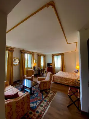 Letto o letti in una camera di Hotel Villa Montanarini