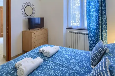 Letto o letti in una camera di Mafalda Apartments