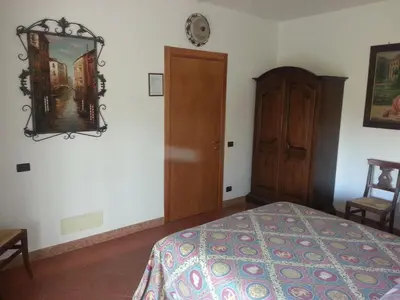 Letto o letti in una camera di Agriturismo Corte Trincerone