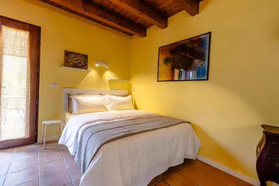 Letto o letti in una camera di Il Laghello Wood House