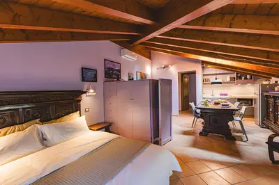 Letto o letti in una camera di Il Laghello Wood House