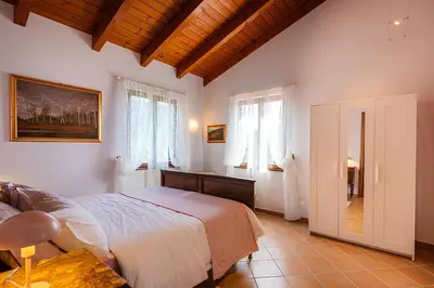 Letto o letti in una camera di Il Laghello Wood House
