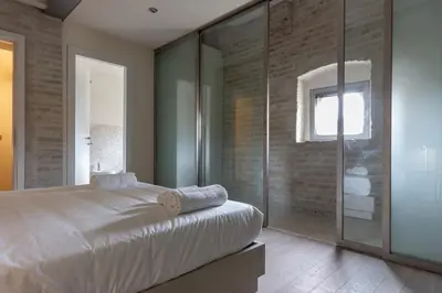 Letto o letti in una camera di Suite Corallo - Smart Holiday
